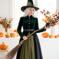 Woman wearing the green gothic witch costume