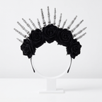 Skeleton hands headpiece on white background
