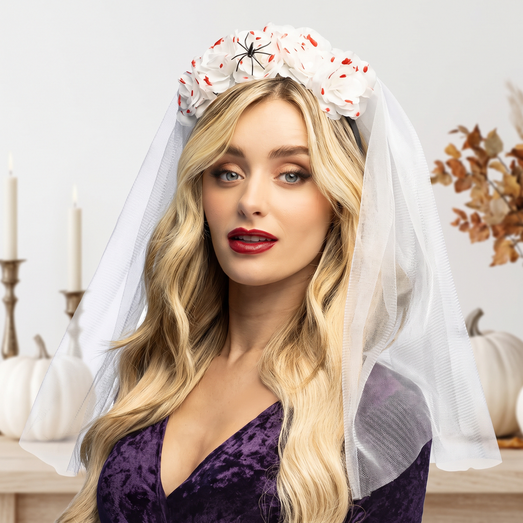 Woman wearing the bleeding blossom tiara with veil