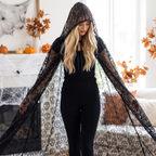 Woman wearing the midnight fiesta hooded lace cape