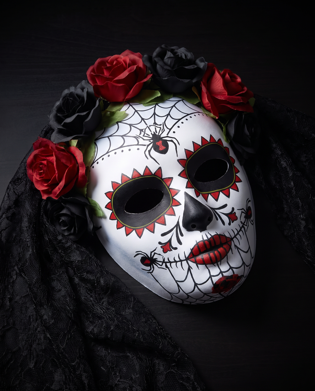 Detail of roses, spider murals and lace veil