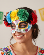 Woman wearing bright flower Day of the Dead eye mask