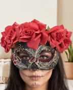 Woman wearing black rose and glitter eye mask