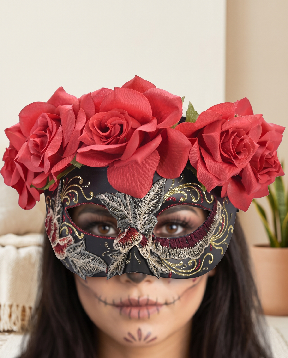 Woman wearing black rose and glitter eye mask