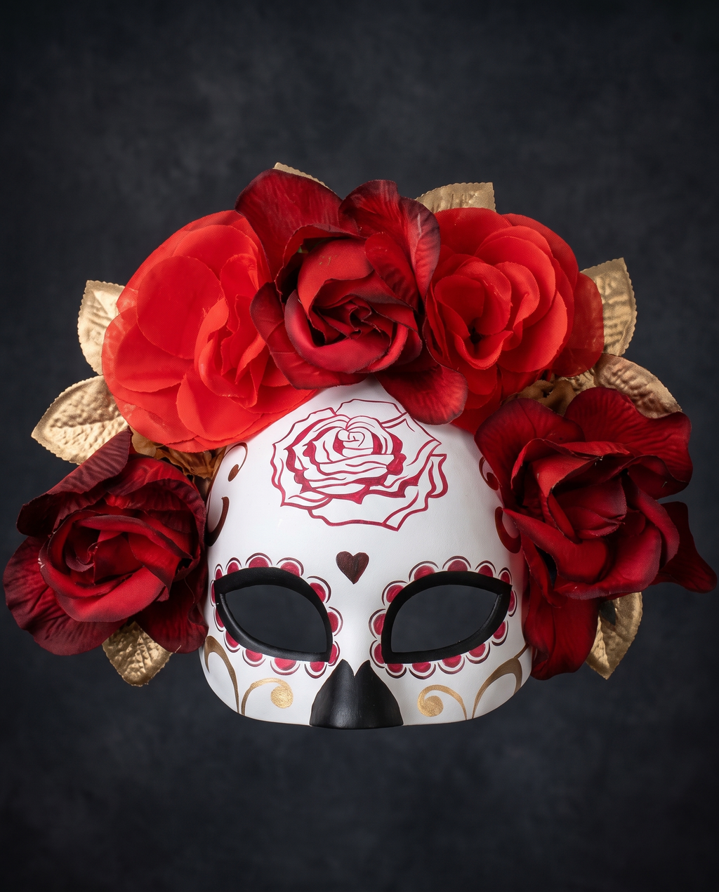 Detail of red and gold fabric flowers