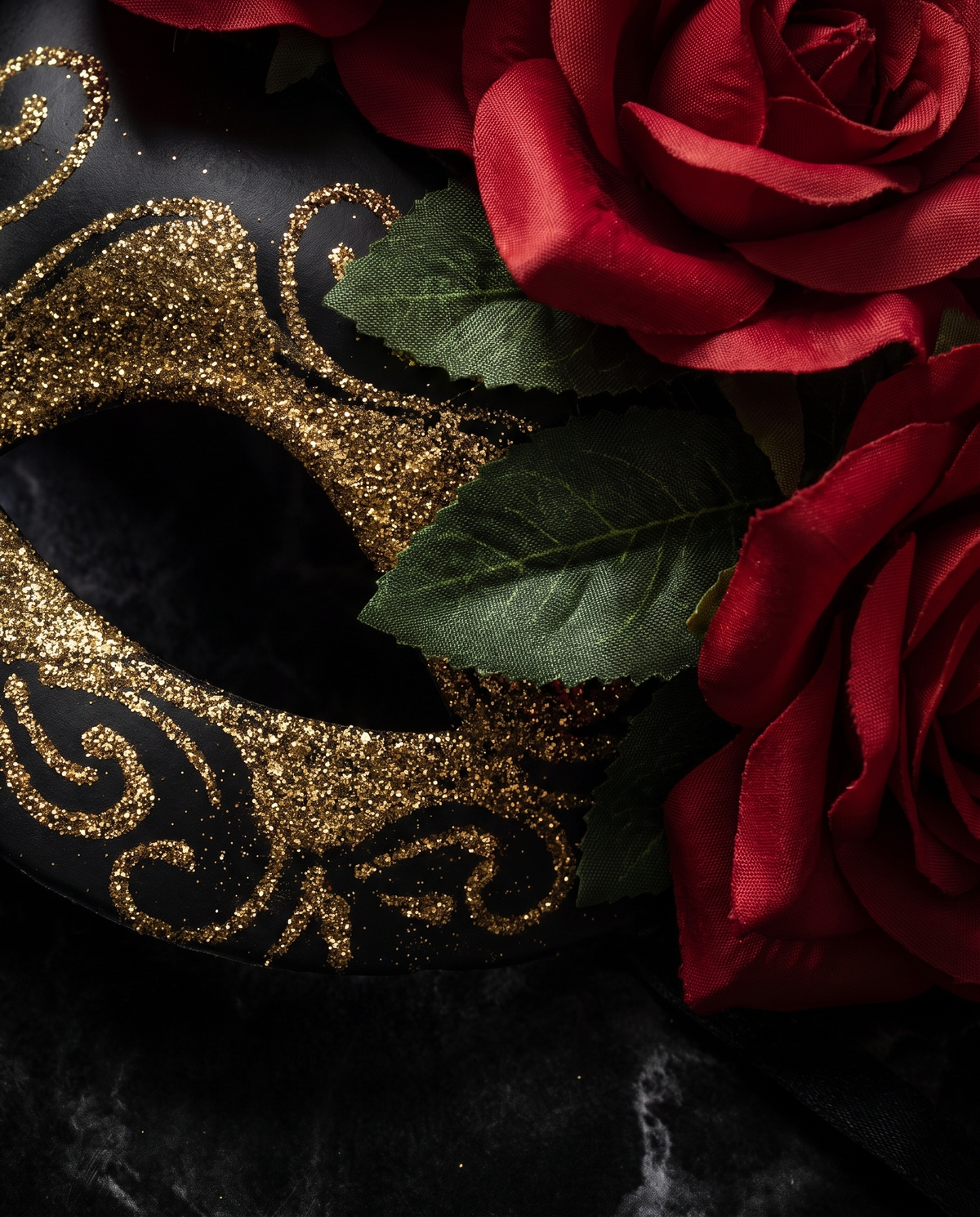 Detail of gold glitter and red roses