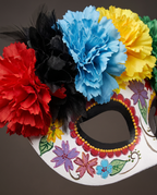 Detail of painted patterns and fabric flowers