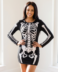 Woman wearing glow-in-the-dark skeleton dress