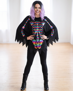 Woman wearing rainbow foil skeleton poncho