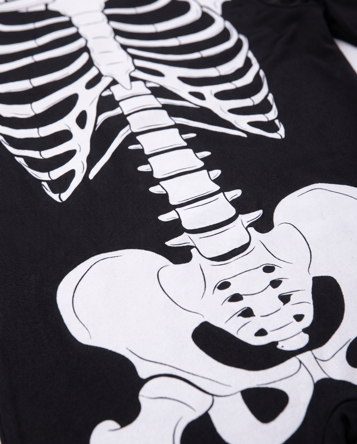 Detail of white skeleton print