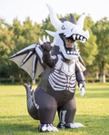 Person wearing inflatable dragon skeleton costume