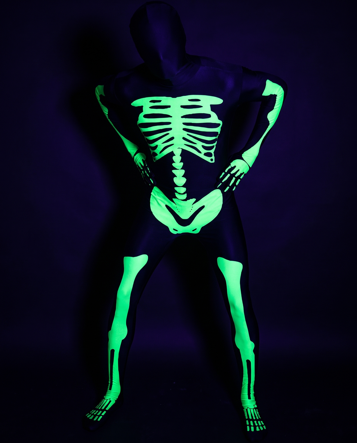 Skeleton morphsuit glowing under UV light