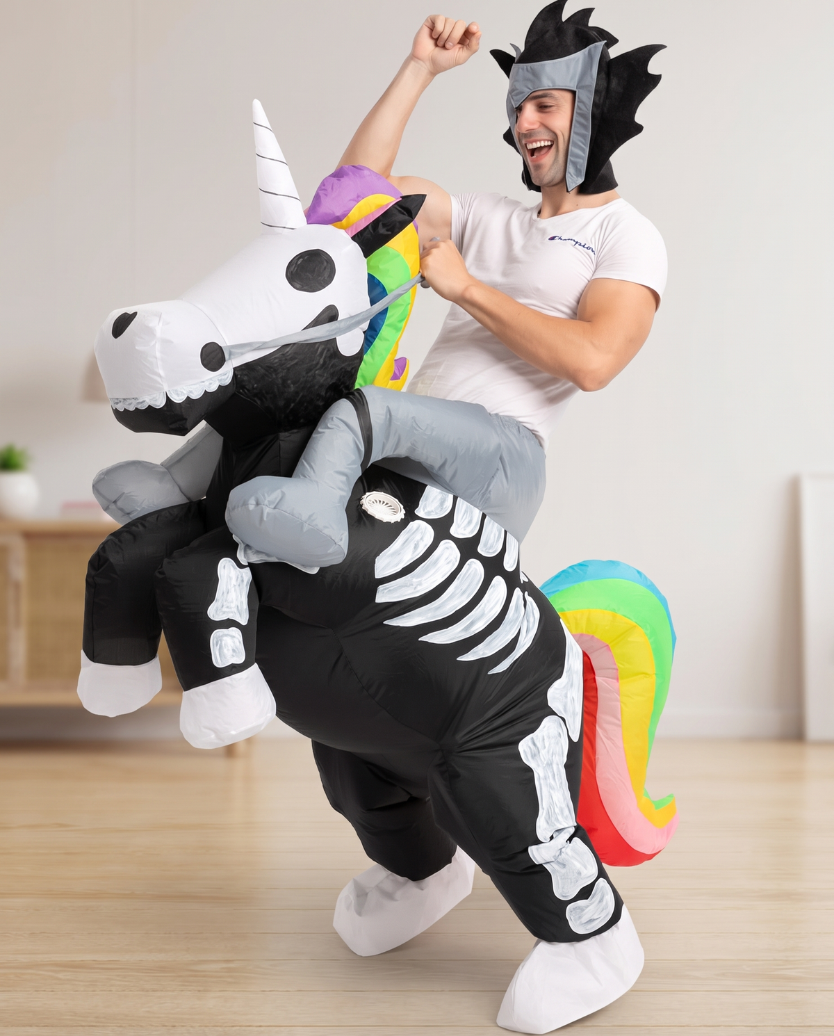 Person wearing ride-on skeleton unicorn inflatable costume