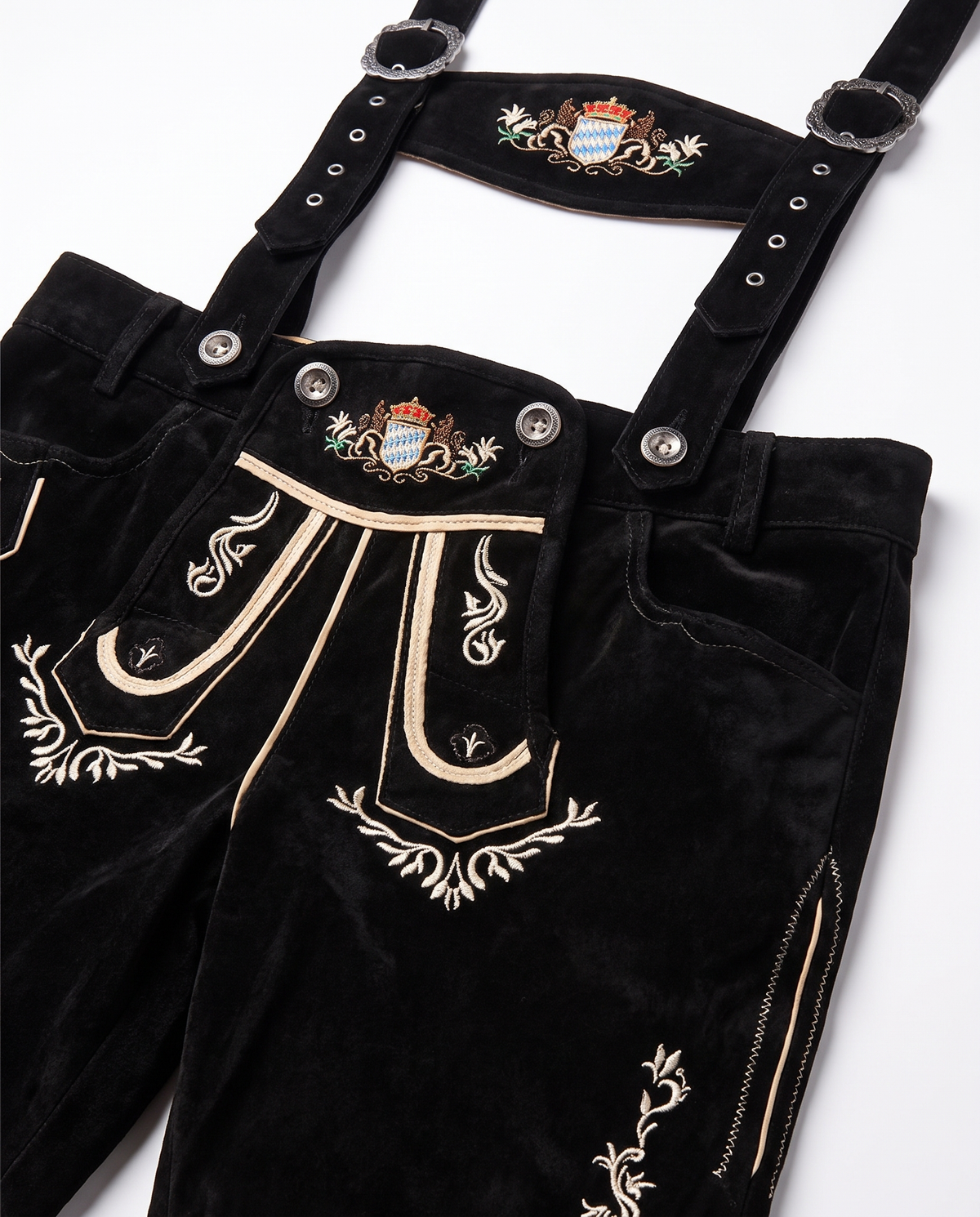 Detail of lederhosen embroidery and suspenders