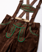 Detail of lederhosen embroidery and suspenders