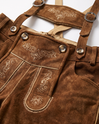 Detail of leather, embroidery and horn buttons