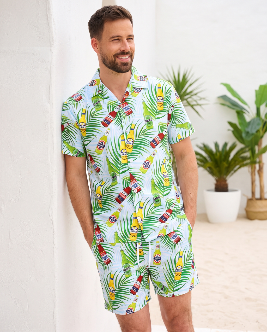 Man wearing tropical beer print shirt and shorts combo