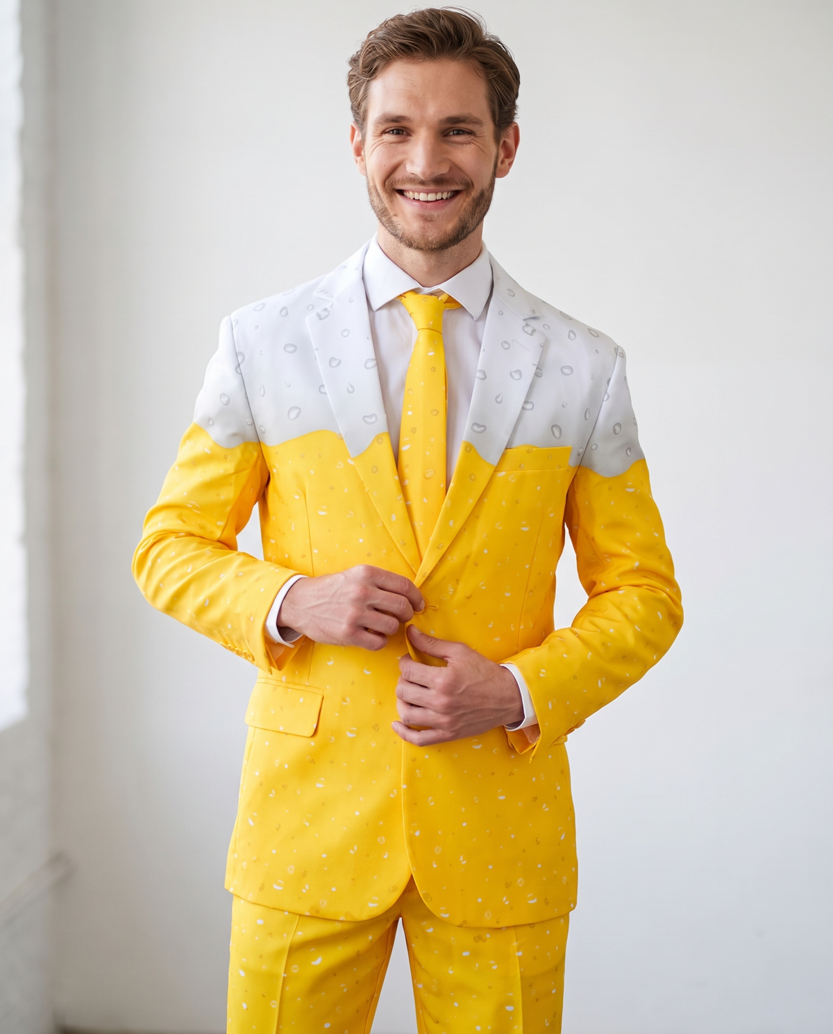 Man wearing yellow beer print party suit