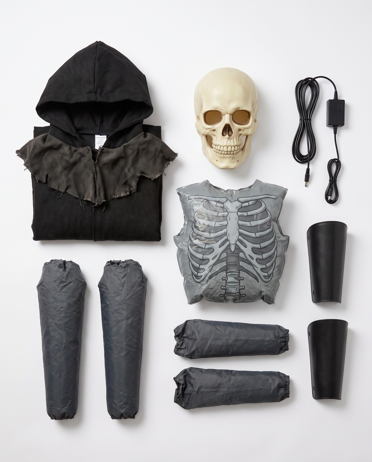 Robe, skull mask, inflatable chest, arms and cord flat lay
